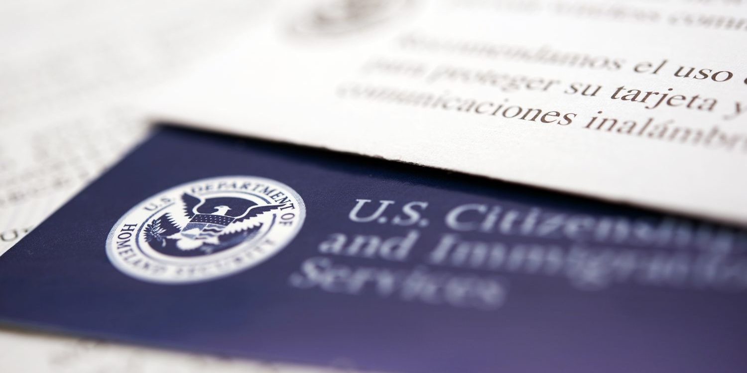 A close-up of official U.S. Citizenship and Immigration Services (USCIS) documents, highlighting the high-stakes, detail-oriented nature of immigration law. This symbolizes the critical need for a flawless intake and case management process, which the Firm Heartbeat experience is designed to build.
